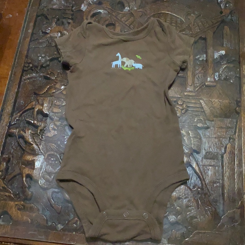Brown onesie with animals on it
